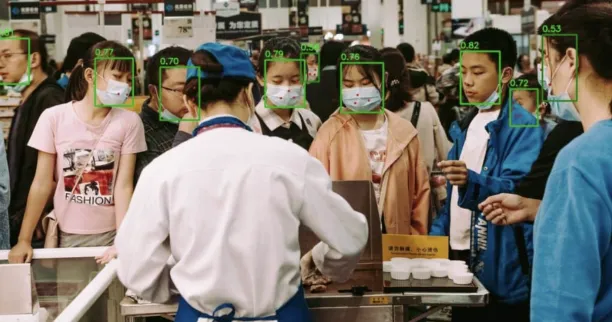 An example of computer vision security: Viso.ai's crowd face detection with deep learning models.