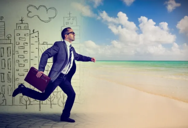 Image describing absence management, illustrating a male employee running out of his workplace towards the beach