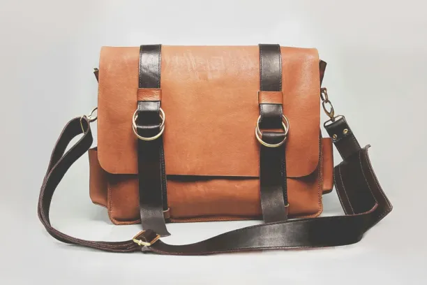 An example image of an orange bag with brown straps.